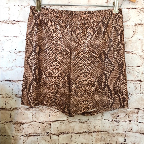 Tennis top and skirt with shorts in animal print - Picture 2 of 6